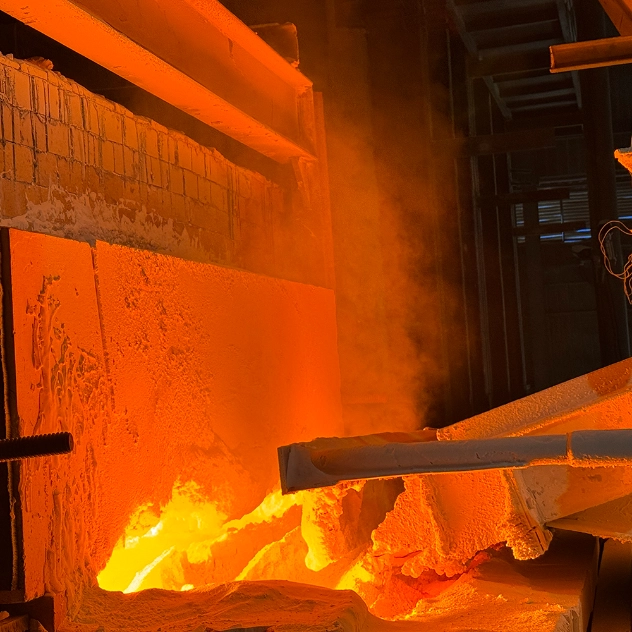 Kiln_charging_during_glass_bottle_production_process